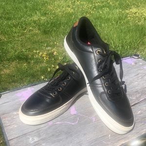Levi, new black sneakers, size 12